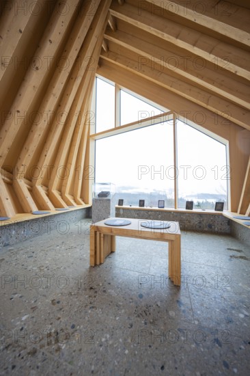 Modern interior with wooden elements and large window showing nature, Sinnraum, Oberreute, Allgäu, Bavaria, Germany