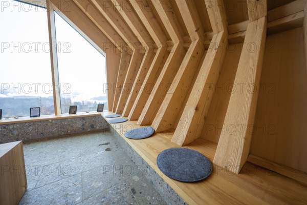 Modern interior with wooden benches and view of the landscape through windows, Sinnraum, Oberreute, Allgäu, Bavaria, Germany