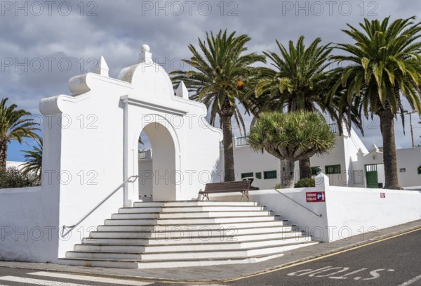 White staircase in a square with palm trees, Teguise, Lanzarote, Canary Islands, Spain