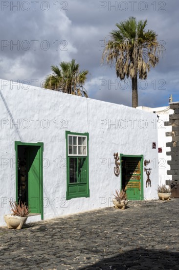 Typical white houses with colored doors and windows, Teguise, Lanzarote, Canary Islands, Spain