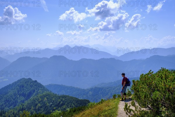 Hikers, mountaineers on Hochfelln, summit, near Bergen, Chiemgau, Upper Bavaria, Bavaria, Germany