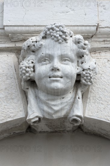 Head of a Bacchus above a gate, Venice, Veneto, Italy