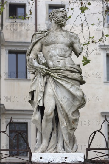 Biblical sculpture with book, Venice, Veneto, Italy