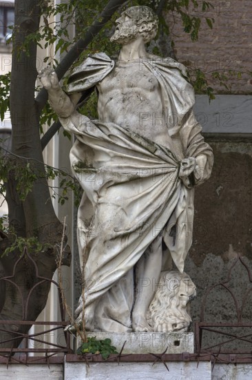 Biblical sculpture with lion, Venice, Veneto, Italy