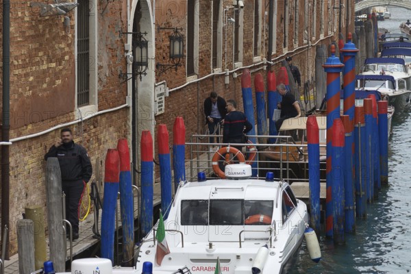 Colourful anchor posts in front of the police station, Venice, Veneto, Italy