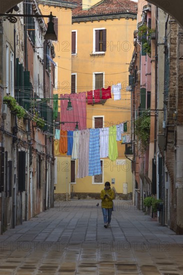 Laundry hung up for tourists in the Castello district, Venice, Veneto, Italy