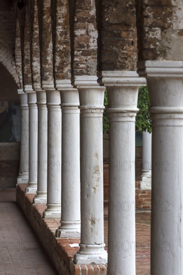 Columns in the cloister of the Madonna dell'Oro parish church, Venice, Veneto, Italy
