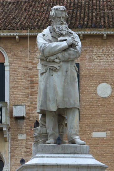Monument by Nicolo Tommaseo, 1802-1874, Italian writer, statue by Francesco Barzaghi, Campo Santo Stefano, Venice, Veneto, Italy