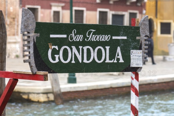 Sign for gondola rides, Venice, Veneto, Italy