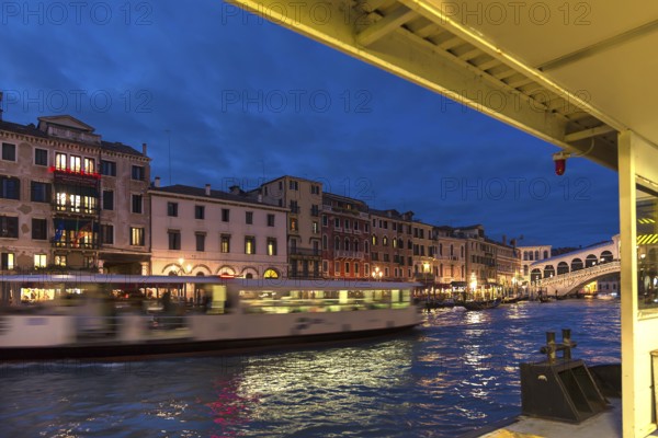 View of the Palazzi on the Grand Canal from a moving traghetto, Venice, Veneto, Italy