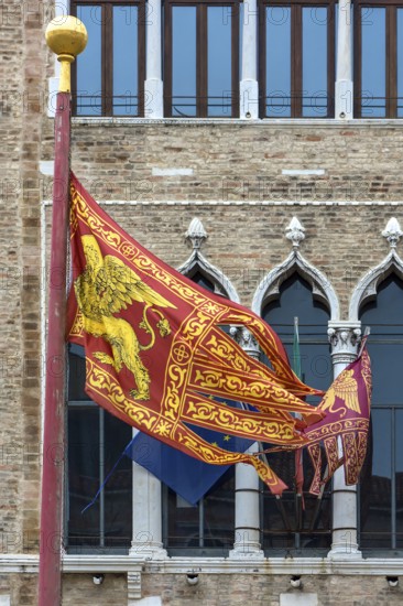 Waving flags of Europe and the Republic of Venice at Palazzo Zaguri, Venice, Venice, Italy
