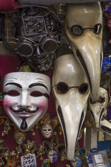 Venician carnival masks at a sales stand, Venice, Veneto, Italy