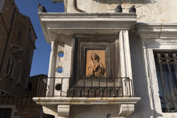 Adoration of Mary at a residential building, Venice, Veneto, Italy