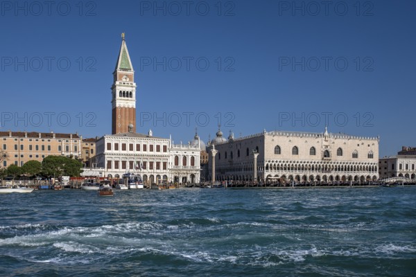 View of St. Mark's Campanile and Doge's Palace from the Grand Canal, blue sky, Venice, Veneto, Italy