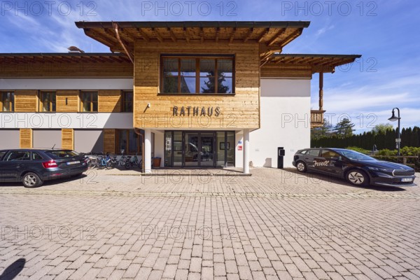Town hall, commercial buildings, alpine buildings, modern architecture, building material wood, lantern, concrete paving, cars, blue sky, cirrus clouds, cirrostratus clouds, town hall square, Inzell, Traunstein district, Bavaria, Germany