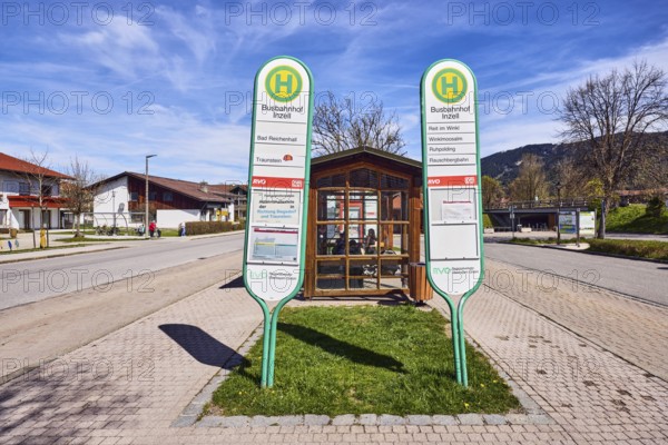 Inzell bus station, Regionalverkehr Oberbayern GmbH, bus stop sign, bus platform, general architecture, residential buildings, bare winter trees, hilly landscape, coniferous forest, blue sky, cirrus clouds, cirrostratus clouds, Traunsteiner Straße, Inzell, district of Traunstein, Bavaria, Germany
