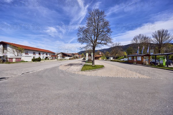 Inzell bus station, general architecture, residential buildings, bare winter trees, blue sky, cirrus clouds, cirrostratus clouds, Traunsteiner Straße, Inzell, Traunstein district, Bavaria, Germany