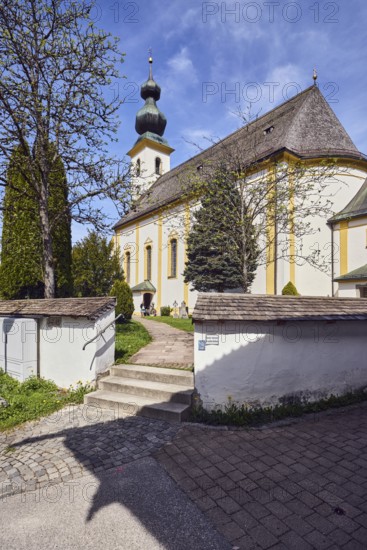 Church of St. Michael, parish church, wall with passage, stairs, lawn, path, trees, blue sky, cirrus clouds, cirrostratus clouds, Kirchweg, Inzell, district of Traunstein, Bavaria, Germany