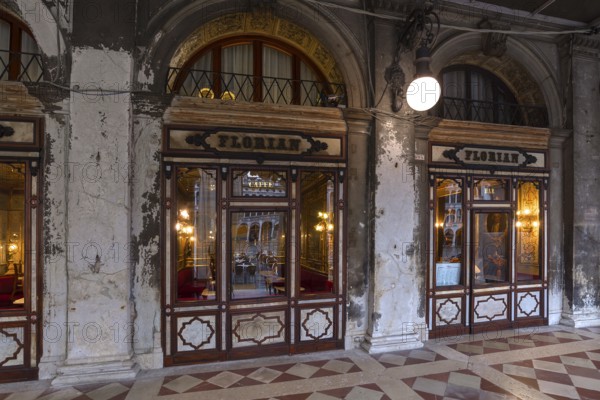 Historic Café Florian in the arcades of the old Procuration, 16th century early in the morning, Venice, Veneto, Italy