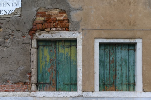 Dilapidated window façade in the old town, Venice, Veneto, Italy
