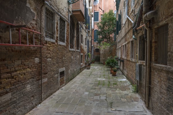 Courtyard between residential buildings in the old town, Venice, Veneto, Italy