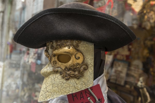 Venetian mask in front of a shop, Venice, Veneto, Italy