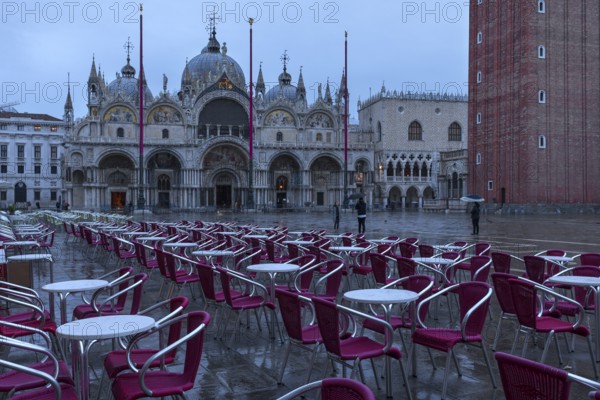 Empty St. Mark's Square with St. Mark's Basilica early in the morning in rainy weather, Venice, Veneto, Italy