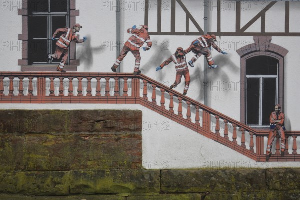 Mural construction by Jaune 2020, alleyway art, graffiti, construction workers jumping on balustrade, staircase, symbol, against, occupational safety, accident prevention, risk, curious, construction site, mason, road worker, Baugasse, Bad Vilbel, Wetterau, Hesse, Germany