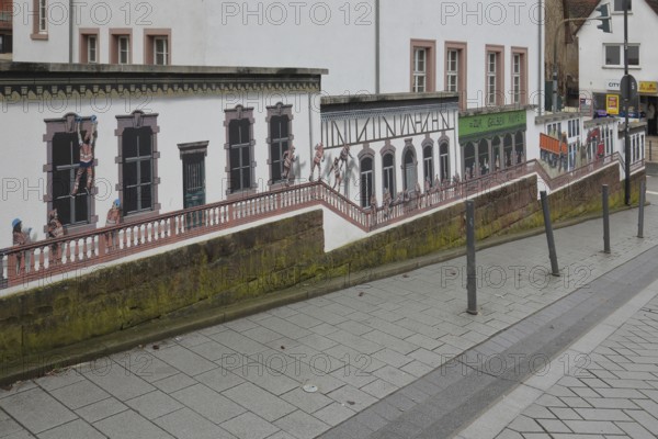 Mural Baubau von Jaune 2020, alleyway art, graffiti, balustrade, construction workers climbing at the window, Baugasse, Bad Vilbel, Wetterau, Hesse, Germany