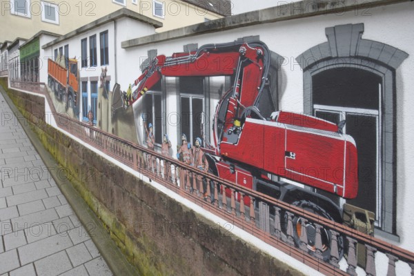 Mural Baubau von Jaune 2020, alleyway art, graffiti, balustrade, excavator, construction site worker, construction vehicle, Baugasse, Bad Vilbel, Wetterau, Hesse, Germany