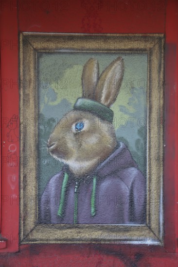 Rabbit mural by Guido Zimmermann 2014, street art, graffiti, rabbit figure with clothes, head, frame, train station, Dörnigheim, Maintal, Hesse, Germany