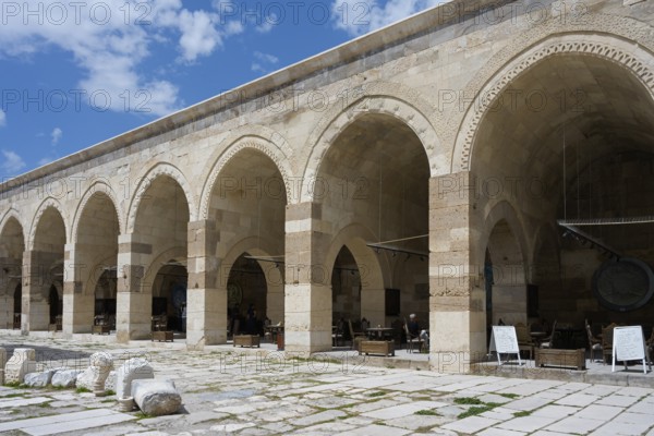 Arcades with ancient stone vaults, with ruins in the foreground of a historic building, courtyard, Sultanhani caravanserai, on the former Silk Road, museum, Sultanhani Kervansaray, Sultanhani, Aksaray province, Turkey