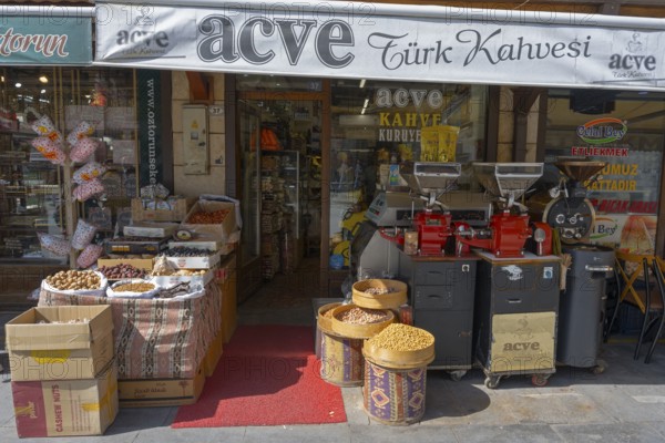 Traditional coffee and spice shop with roasters and baskets in the entrance area, Konya, Central Anatolia, Turkey
