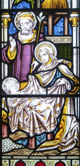 Detail of stained glass window depicting the nativity by Clayton and Bell, church of Saint James, Avebury, Wiltshire, England, UK