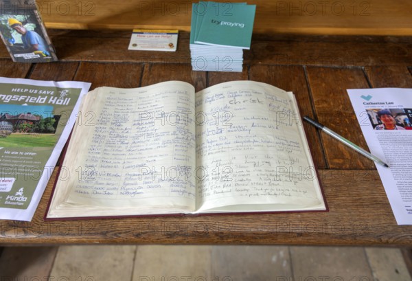 Visitor's book inside church of Saint Michael, Beccles, Suffolk, England, UK