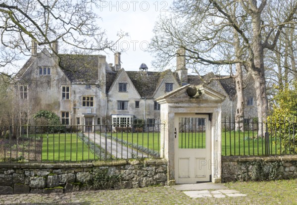 Railings and doorway of historic manor house building, Avebury Manor, Wiltshire, England, UK