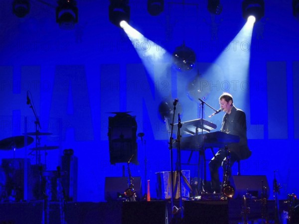 Musician Hans-Jürgen Buchner, performance with his group Haindling, here at the Plassenburg concert in Kulmbach 2024, Bavaria (for editorial use only)