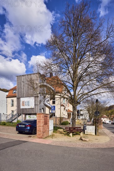 Kindergarten, Catholic Kindergarten St. Michael, slide, play equipment, modern architecture, parking boxes with car, lantern, tree, blue sky, cumulus clouds, Hoffuhre confluence in Untere Forststraße, Waldaschaff, Lower Franconia, Aschaffenburg district, Bavaria, Germany