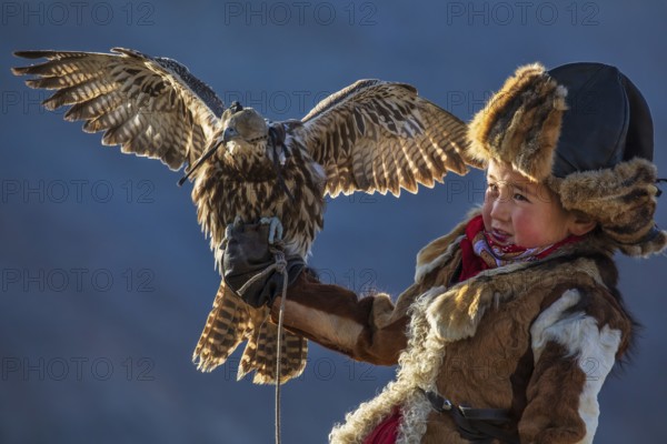 Bayan-Ölgii, Mongolia. The berkutchi are traditional eagle hunters who train Golden Eagle to hunt foxes and other small animals across the Altai Mountains. This ancient nomadic practice, passed down through generations, is both a means of winter survival and a strong symbol of Kazakh cultural identity in western Mongolia. Today, girls and women also have the opportunity to become eagle hunters, continuing and renewing this centuries-old tradition