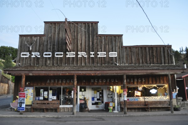 A rustic wooden grocery store marked 'Groceries', Mitchell, Oregon, USA