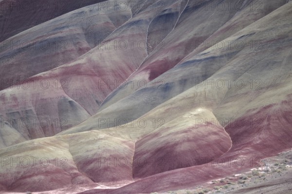 Abstract patterns in red and beige colored rocks, John Day Fossil Beds National Monument, Painted Hills Unit, Oregon, USA