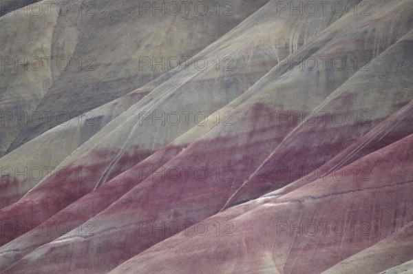 Abstract view of colored rocks with natural stripes and gentle shapes, John Day Fossil Beds National Monument, Painted Hills Unit, Oregon, USA