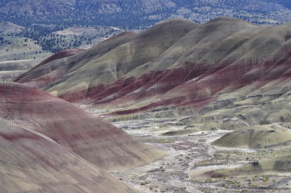 Colourful, patterned hills with stripes of different colors show geological diversity, John Day Fossil Beds National Monument, Painted Hills Unit, Oregon, USA