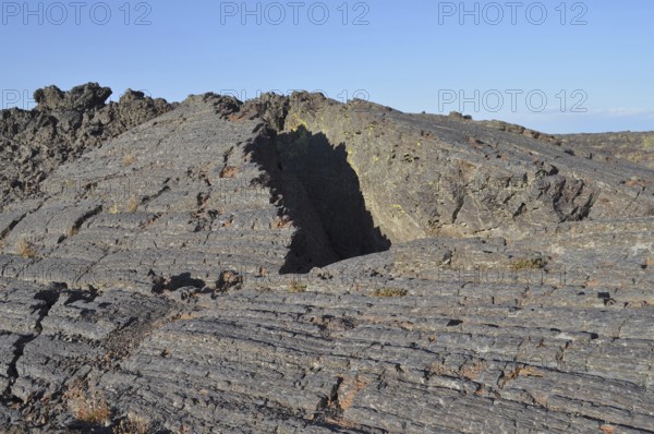 Close-up of a structured, dry lava rock formation with cracks and ridges, Craters of the Moon National Monument, Idaho, USA