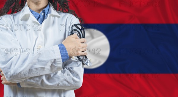 Healthcare professional with Laos flag background. Professional doctor holding stethoscope on Laos flag background
