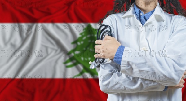 Healthcare professional with Lebanon flag background. Professional doctor holding stethoscope on Lebanon flag background