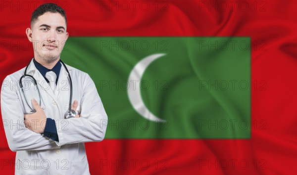 Portrait of medical professional on Maldives flag background. Maldivian national health system