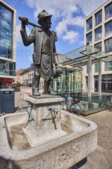 Häckerbrunnen, fountain with bronze sculpture, sculptor Richard Rother, general architecture, commercial building, pedestrian zone, bicycle, blue sky, cumulus clouds, intersection of Schönbornstraße street with marketplace square, Würzburg, Lower Franconia, district-free city, Bavaria, Germany