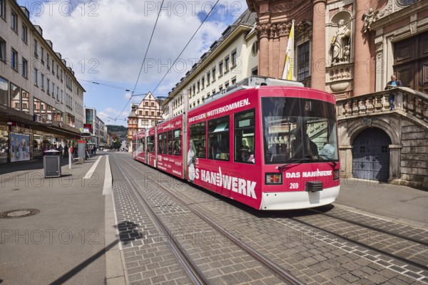 Tram, overhead lines, tram tracks, cathedral tram stop, city center, pedestrian zone, general architecture, residential and commercial buildings, blue sky, cumulus clouds, Kürschnerhof street, Würzburg, Lower Franconia, district-free city, Bavaria, Germany