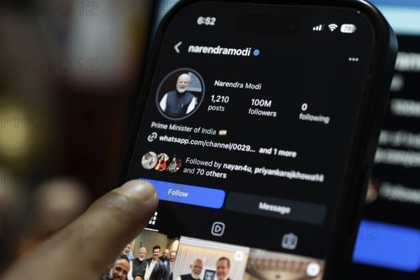 In this photo illustration, a smartphone screen displaying the official Instagram profile of Indian Prime Minister Narendra Modi with 100 million followers, in Guwahati, India on 26 February 2026. PM Narendra Modi has crossed 100 million followers on Instagram, marking a major social media milestone and highlighting his strong digital reach and global online influence